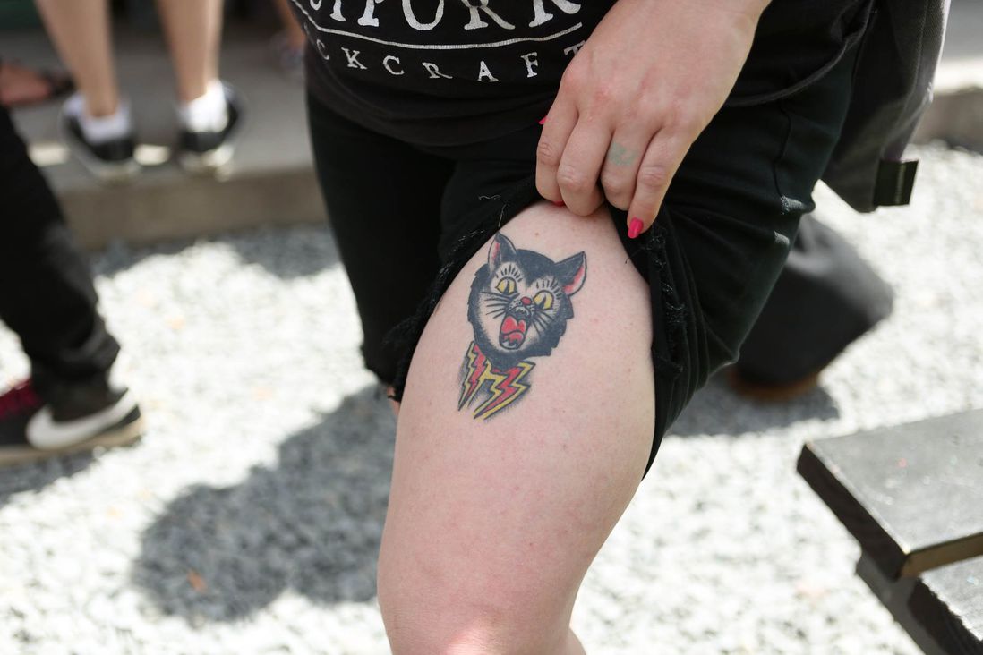 Yet another tattoo of a cat proudly displayed by its owner.<br/>
